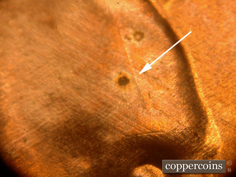 Die-stage B marker on 2014P•1DO•002 (2014 Doubled Die Obverse).