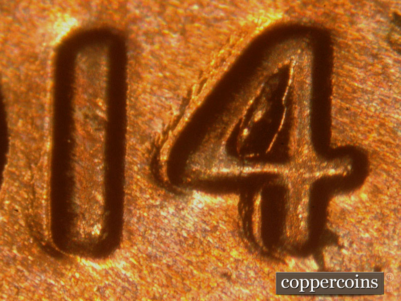 Die-stage B marker on 2014P•1DO•003 (2014 Doubled Die Obverse).
