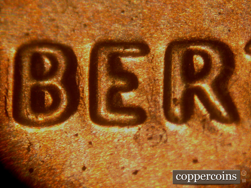 Die-stage B marker on 2014P•1DO•003 (2014 Doubled Die Obverse).
