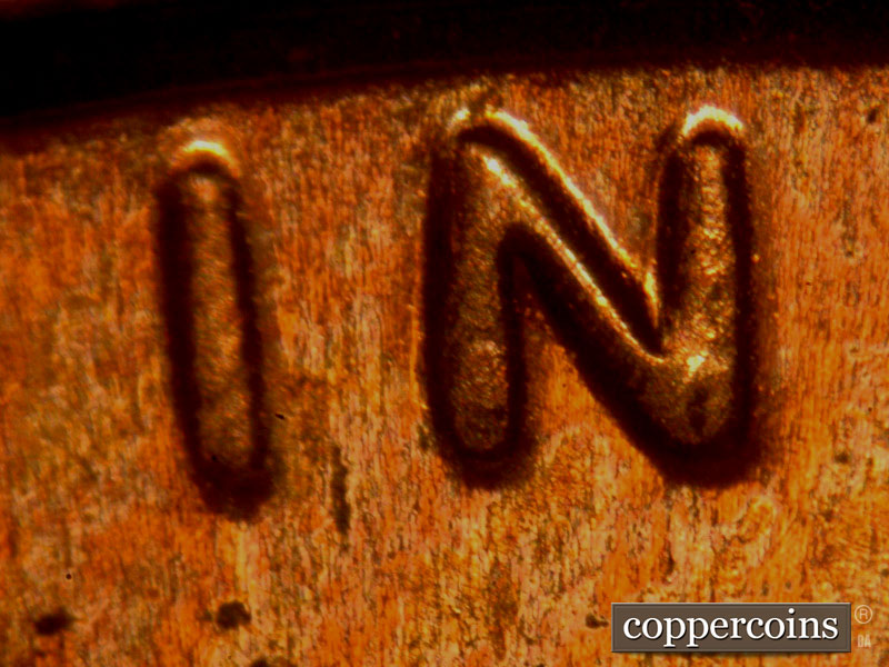 Die-stage B marker on 2014P•1DO•003 (2014 Doubled Die Obverse).