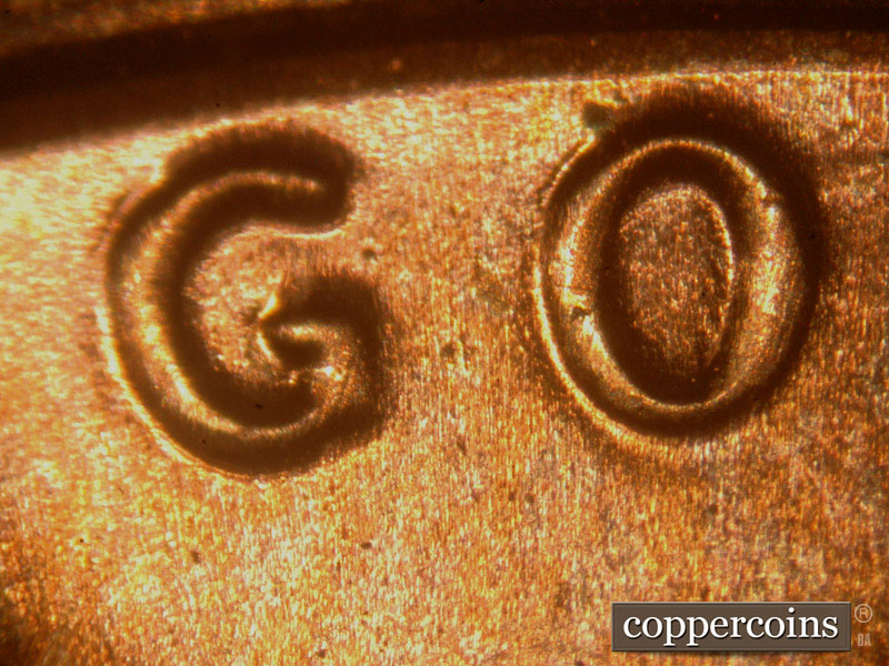 Die-stage B marker on 2014P•1DO•003 (2014 Doubled Die Obverse).