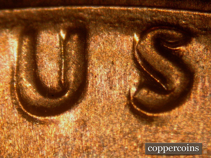 Die-stage B marker on 2014P•1DO•003 (2014 Doubled Die Obverse).