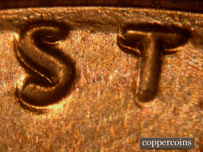 Die-stage B marker on 2014P•1DO•003 (2014 Doubled Die Obverse).