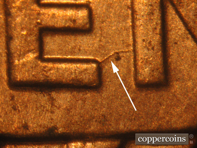 Die-stage B marker on 2014P•1DO•003 (2014 Doubled Die Obverse).