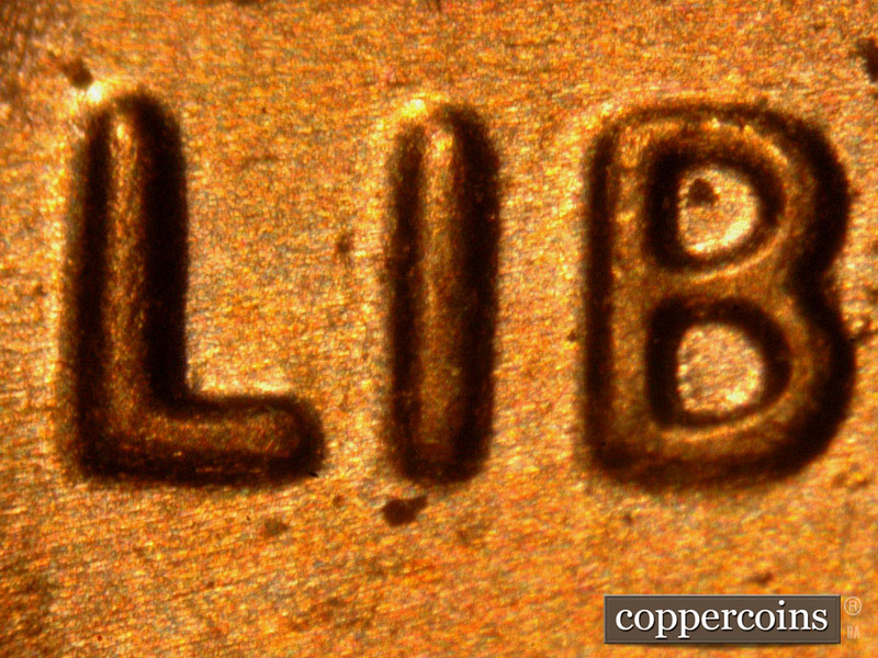 Die-stage B marker on 2014P•1DO•005 (2014 Doubled Die Obverse).