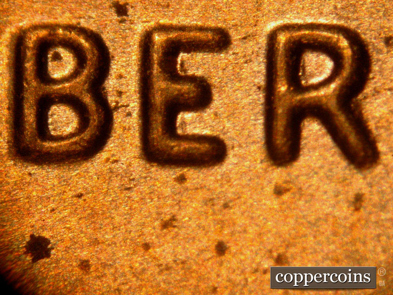 Die-stage B marker on 2014P•1DO•005 (2014 Doubled Die Obverse).