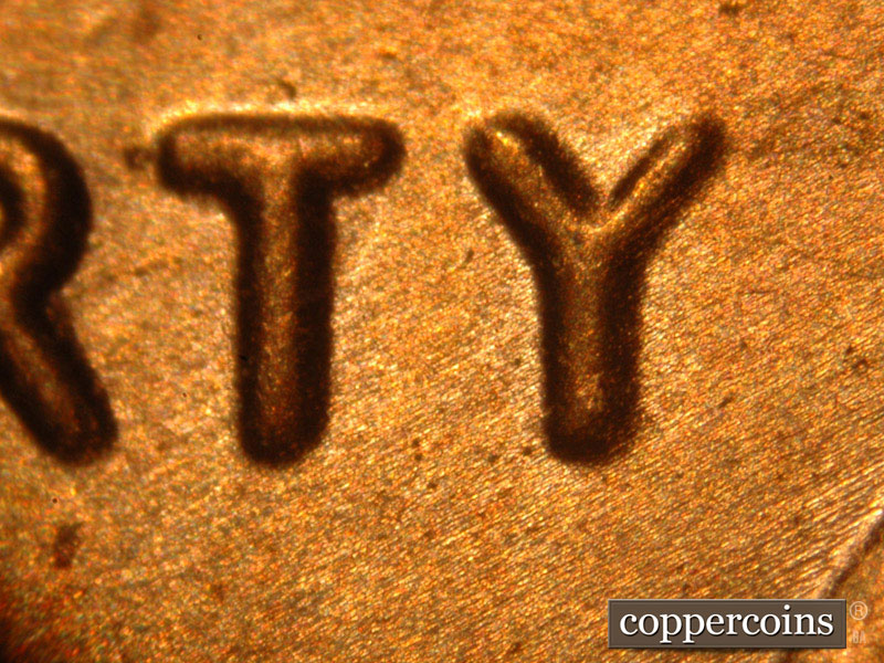 Die-stage B marker on 2014P•1DO•005 (2014 Doubled Die Obverse).