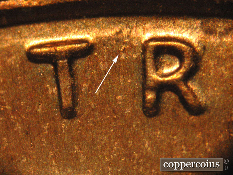 Die-stage B marker on 2014P•1DO•005 (2014 Doubled Die Obverse).