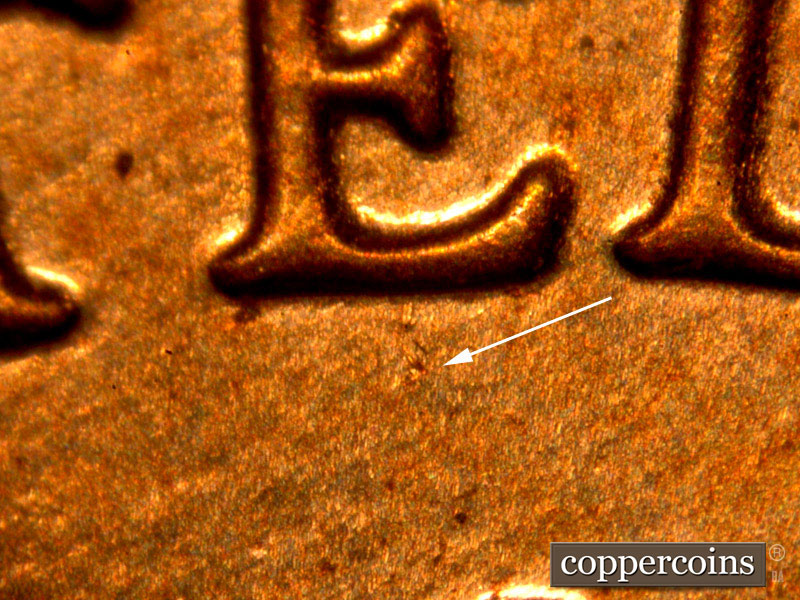 Die-stage B marker on 2014P•1DO•005 (2014 Doubled Die Obverse).