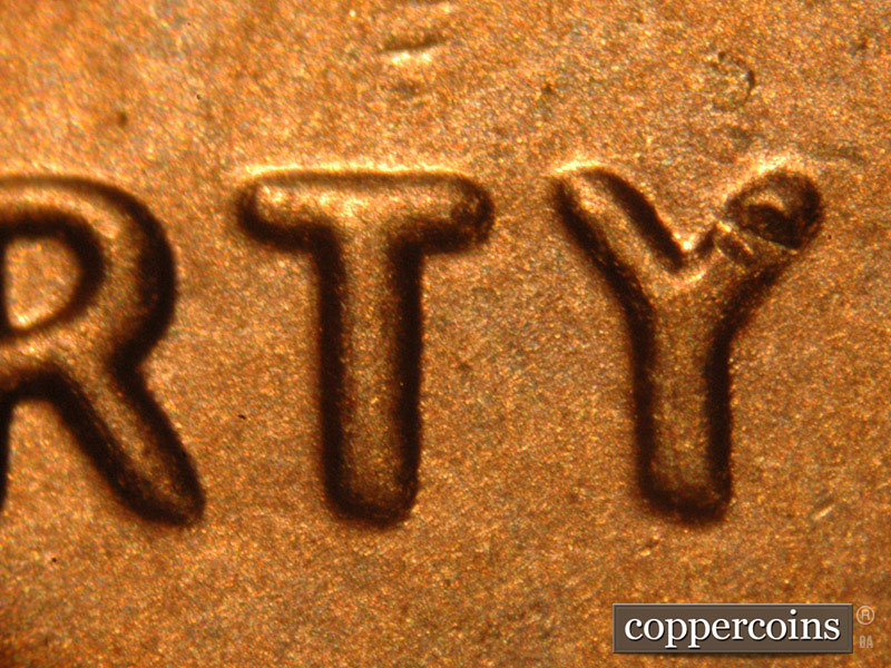 Die-stage B marker on 2014P•1DO•006 (2014 Doubled Die Obverse).