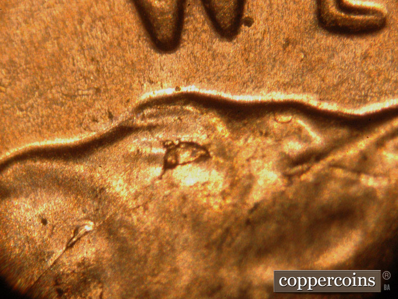 Die-stage B marker on 2014P•1DO•006 (2014 Doubled Die Obverse).