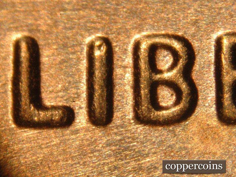 Die-stage C marker on 2014P•1DO•007 (2014 Doubled Die Obverse).