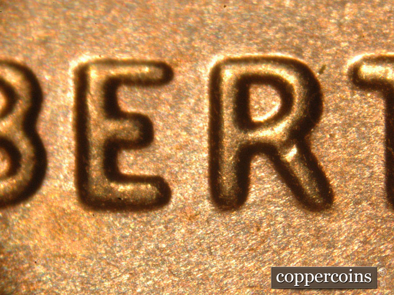 Die-stage C marker on 2014P•1DO•007 (2014 Doubled Die Obverse).
