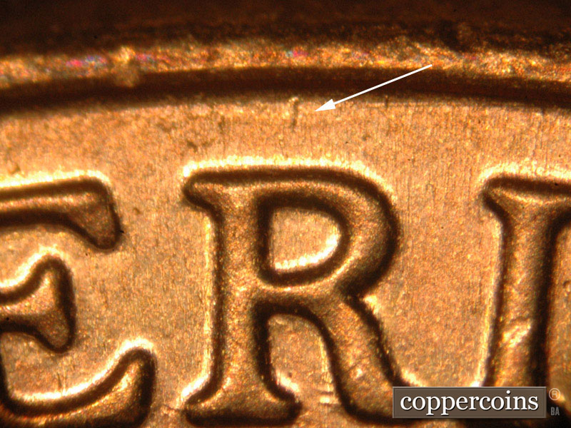 Die-stage C marker on 2014P•1DO•007 (2014 Doubled Die Obverse).