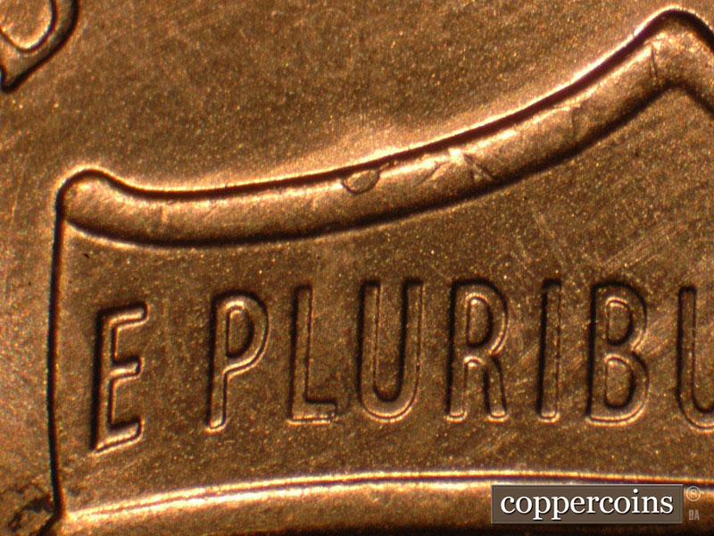 Die-stage B marker on 2014P•1DO•009 (2014 Doubled Die Obverse).