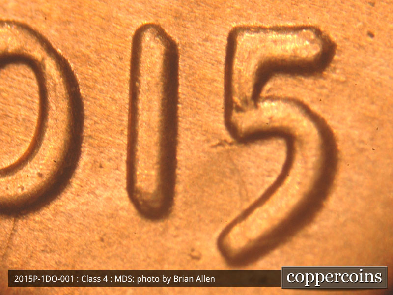 Die-stage B marker on 2015P•1DO•001 (2015 Doubled Die Obverse).