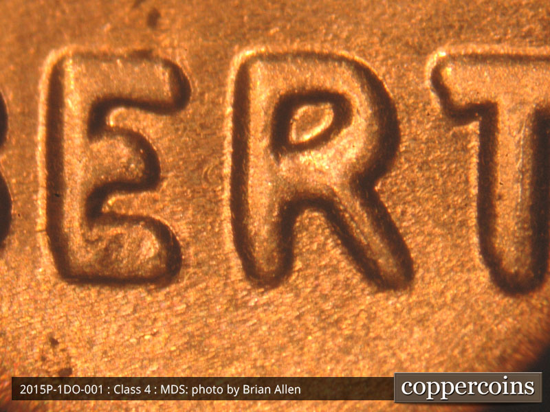 Die-stage B marker on 2015P•1DO•001 (2015 Doubled Die Obverse).