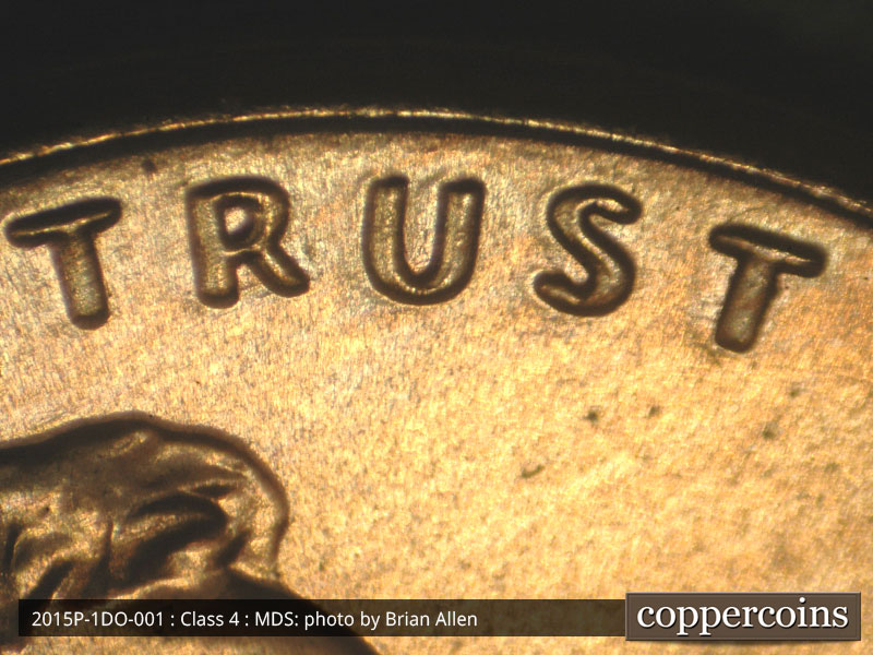 Die-stage B marker on 2015P•1DO•001 (2015 Doubled Die Obverse).