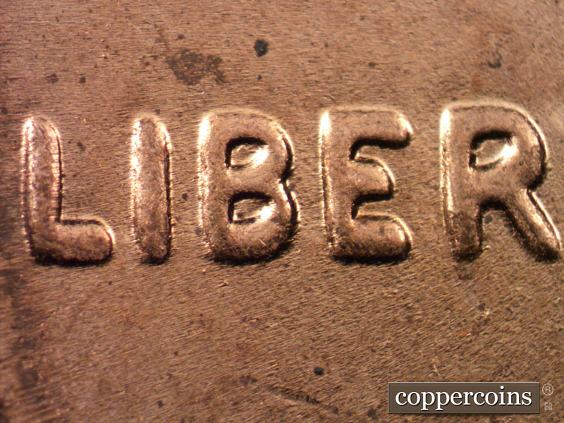Die-stage C marker on 2015P•1DO•001 (2015 Doubled Die Obverse).