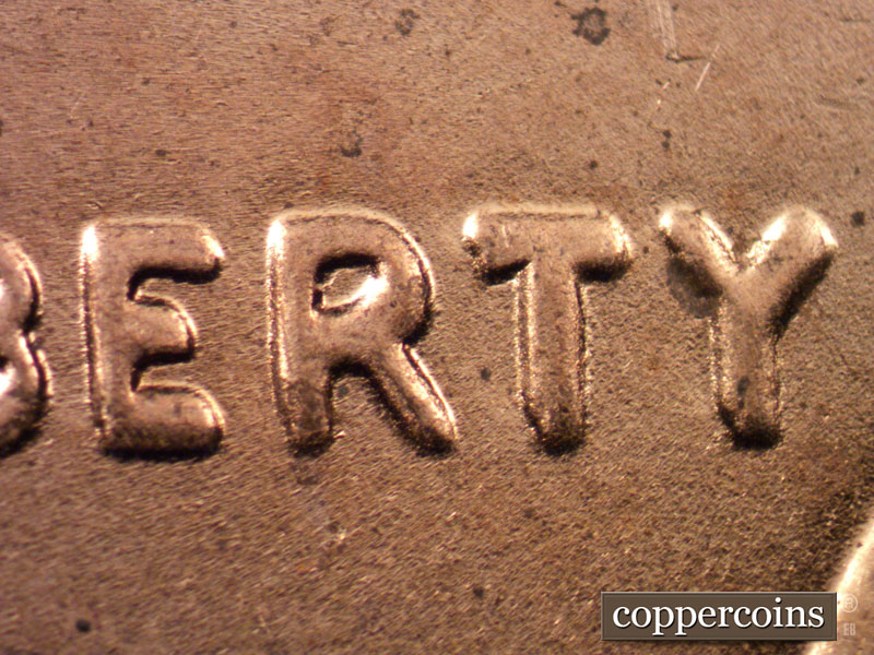 Die-stage C marker on 2015P•1DO•001 (2015 Doubled Die Obverse).