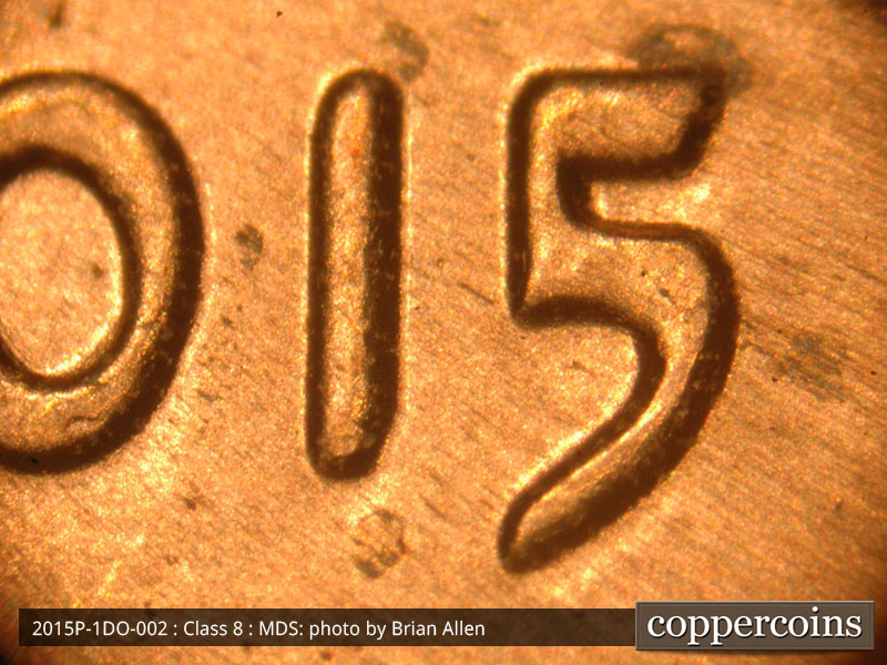 Die-stage B marker on 2015P•1DO•002 (2015 Doubled Die Obverse).