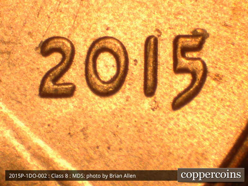 Die-stage B marker on 2015P•1DO•002 (2015 Doubled Die Obverse).
