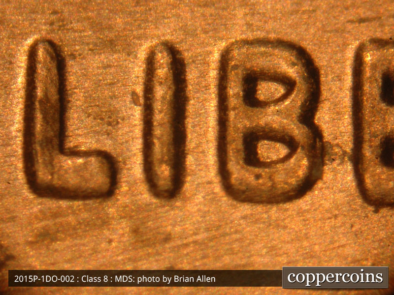 Die-stage B marker on 2015P•1DO•002 (2015 Doubled Die Obverse).