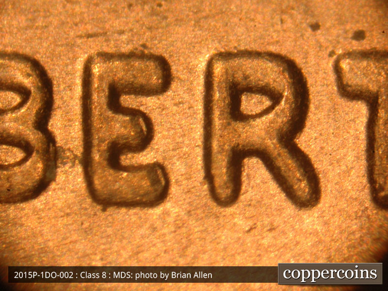 Die-stage B marker on 2015P•1DO•002 (2015 Doubled Die Obverse).