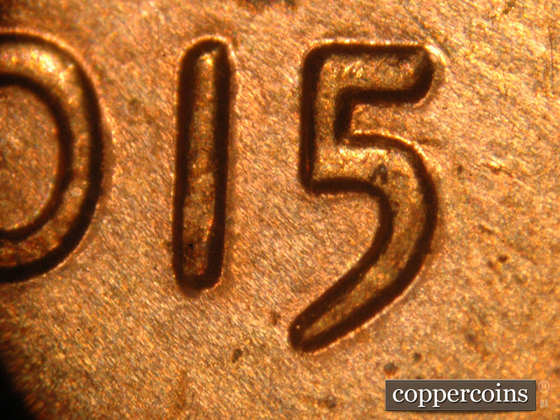 Die-stage C marker on 2015P•1DO•003 (2015 Doubled Die Obverse).