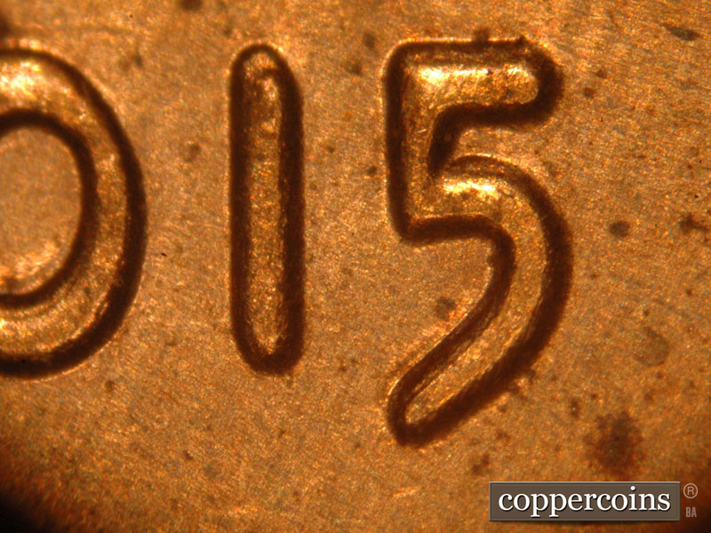 Die-stage C marker on 2015P•1DO•004 showing Very strong doubling is seen on the date.
