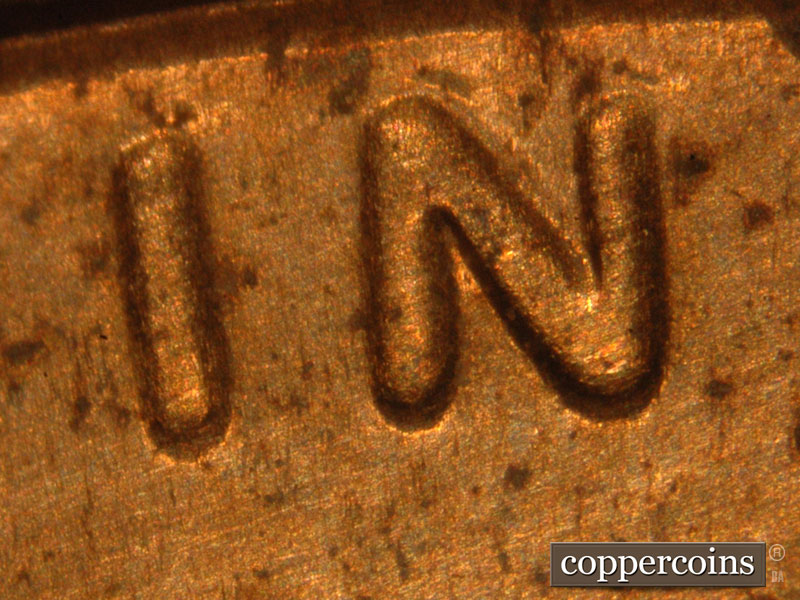 Die-stage C marker on 2015P•1DO•004 (2015 Doubled Die Obverse).