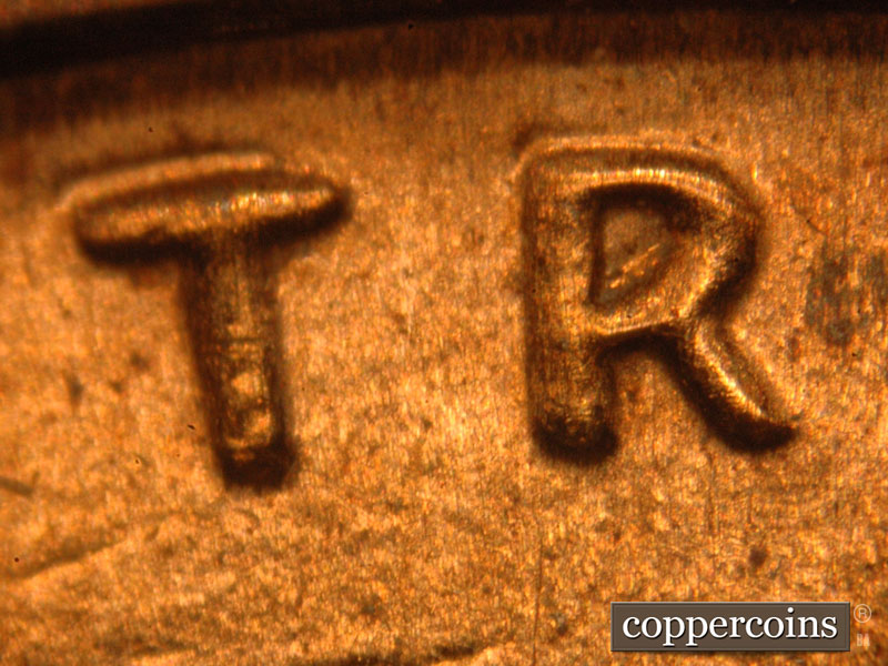 Die-stage C marker on 2015P•1DO•004 (2015 Doubled Die Obverse).