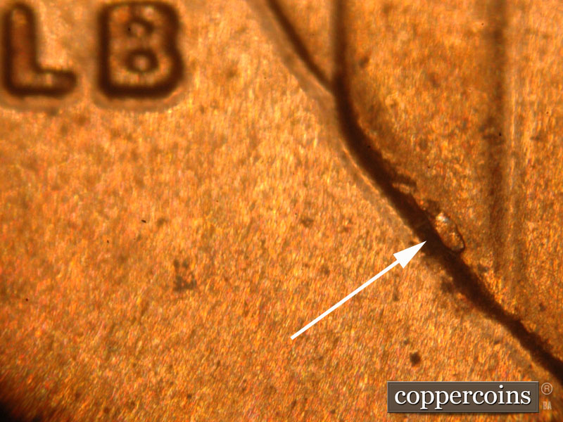 Die-stage C marker on 2015P•1DO•004 (2015 Doubled Die Obverse).