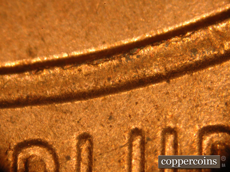 Die-stage C marker on 2015P•1DO•004 (2015 Doubled Die Obverse).