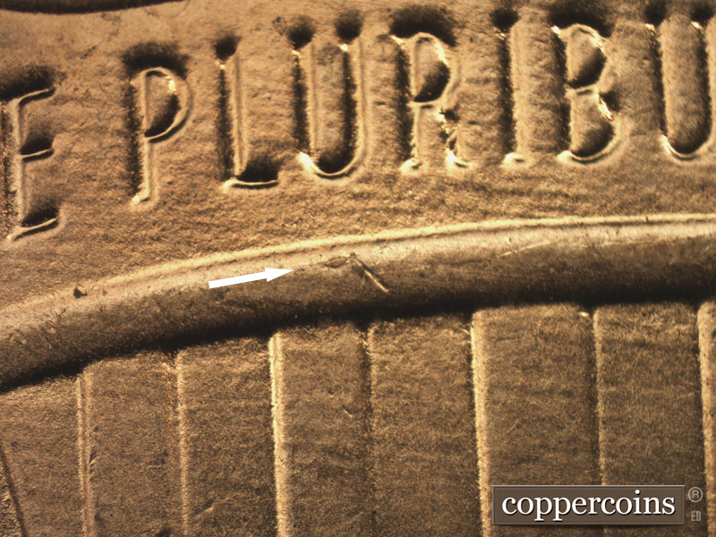 Die-stage B marker on 2015P•1DR•001 (2015 Doubled Die Reverse).