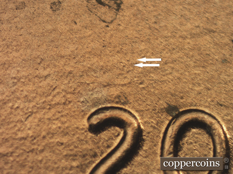 Die-stage B marker on 2015P•1DR•001 (2015 Doubled Die Reverse).
