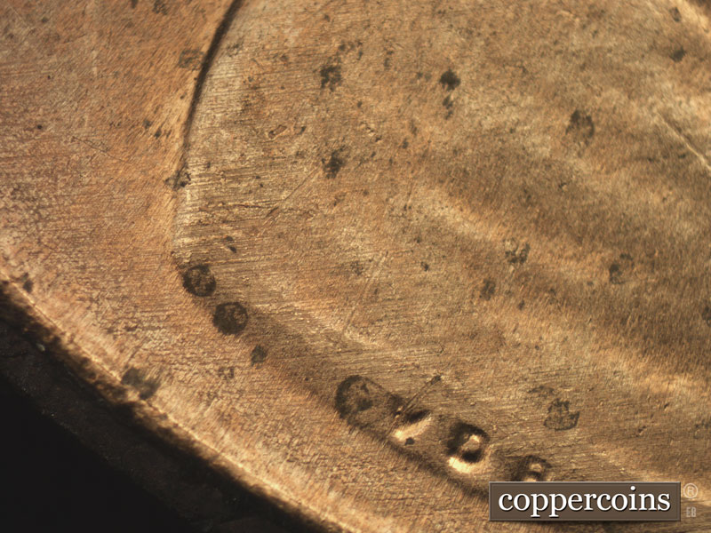Die-stage B marker on 2015P•1DR•001 (2015 Doubled Die Reverse).