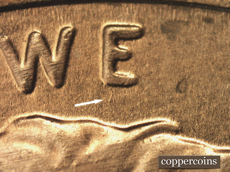 Die-stage B marker on 2015P•1DR•001 (2015 Doubled Die Reverse).