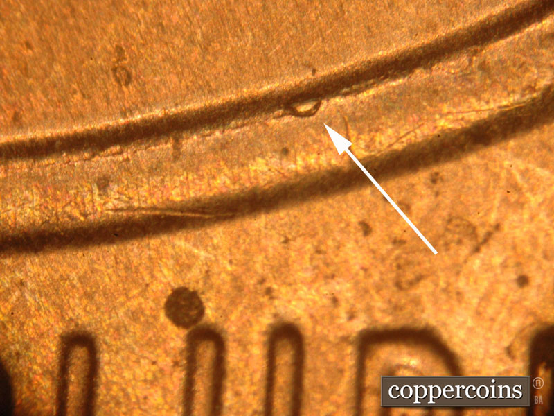 Die-stage B marker on 2016P•1DO•002 (2016 Doubled Die Obverse).