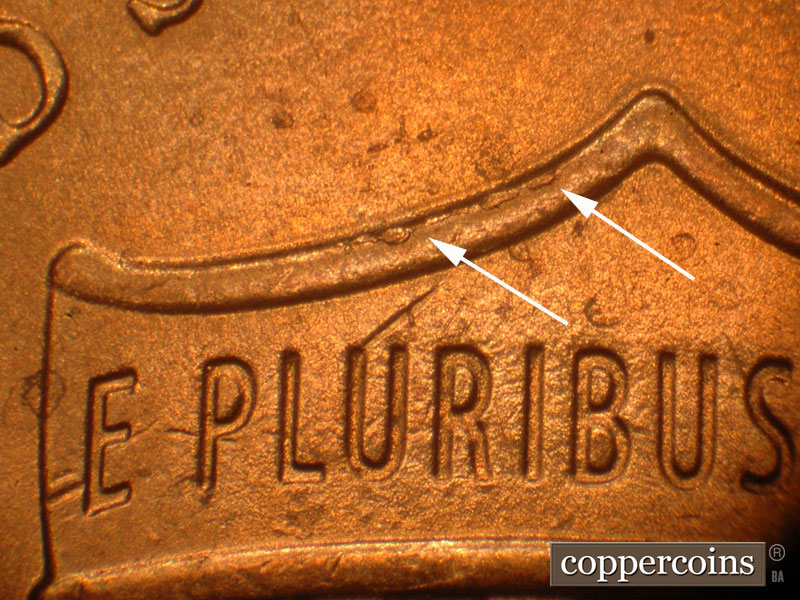 Die-stage C marker on 2016P•1DO•004 showing Die chips on the top of the shield.