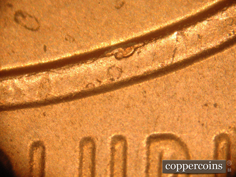 Die-stage B marker on 2016P•1DO•011 (2016 Doubled Die Obverse).