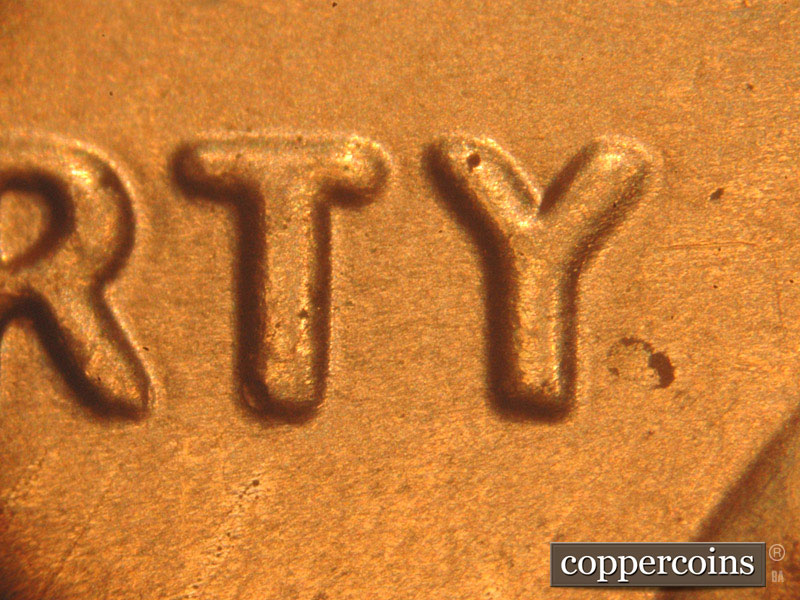 Die-stage B marker on 2016P•1DO•012 (2016 Doubled Die Obverse).