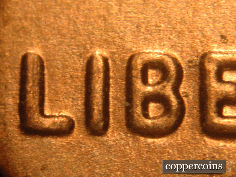 Die-stage B marker on 2016P•1DO•013 showing Thickness on LIBERTY.