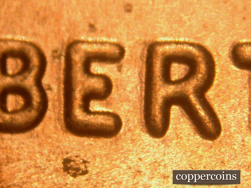 Die-stage B marker on 2016P•1DO•013 showing Thickness on LIBERTY.