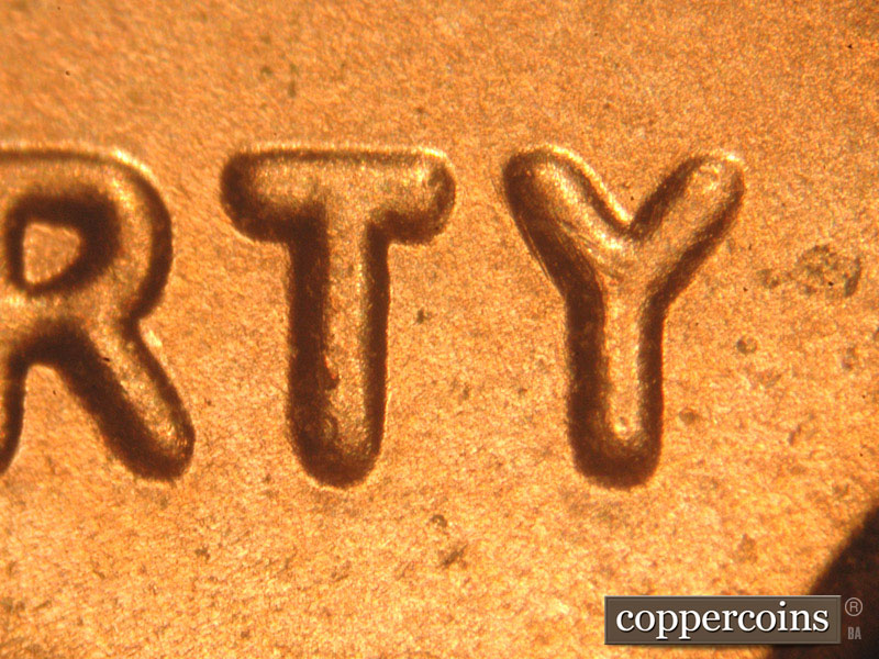 Die-stage B marker on 2016P•1DO•013 showing Thickness on LIBERTY.