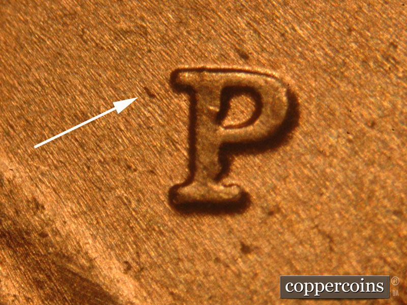 Die-stage B marker on 2017P•1DO•004 showing A die dot to the west of the mint mark.