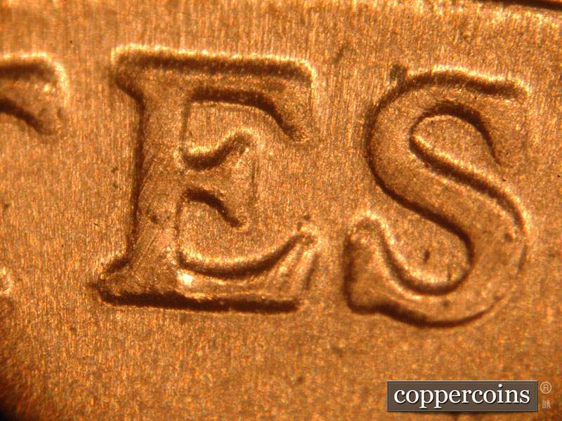 Die-stage C marker on 2018D•1DR•001 (2018 Doubled Die Reverse).