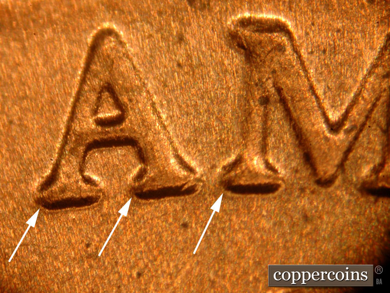 Die-stage C marker on 2018D•1DR•001 showing Slight separation on the lower serifs on the A and M of AMERICA.