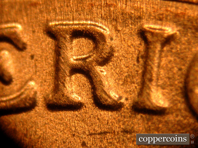 Die-stage C marker on 2018D•1DR•001 (2018 Doubled Die Reverse).