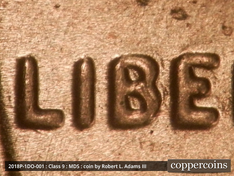 Die-stage B marker on 2018P•1DO•001 showing Very strong extra thickness with notching shows to the north on LIBERTY.